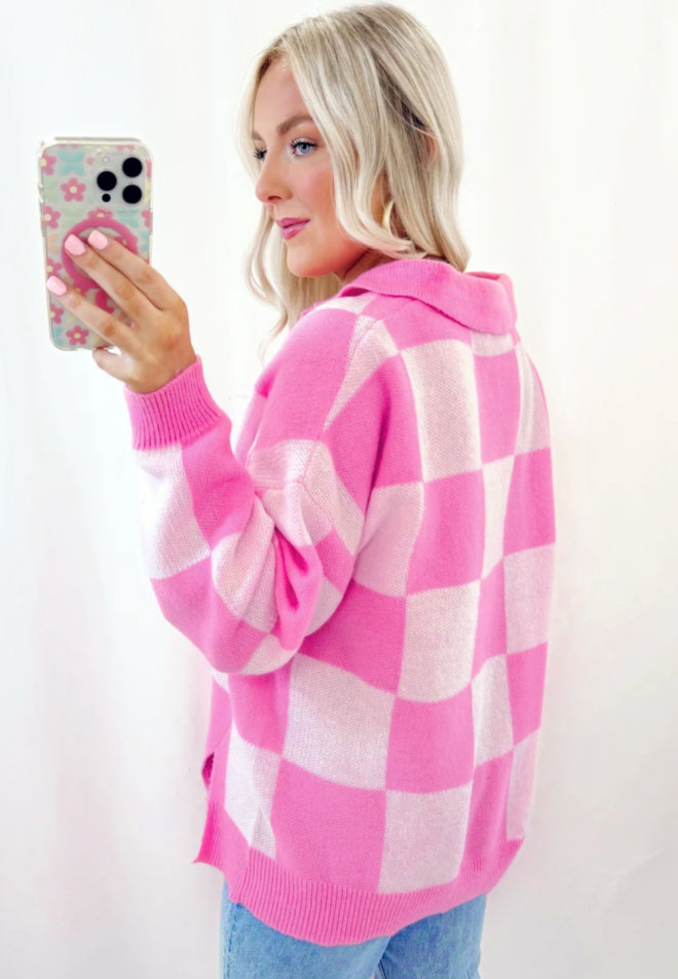 Pink checkerboard half button collared drop shoulder sweater